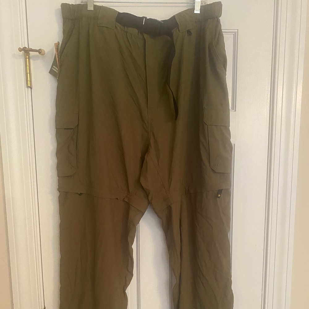 New with tags adult Boy Scout pants.  Legs unzip to be worn as shorts